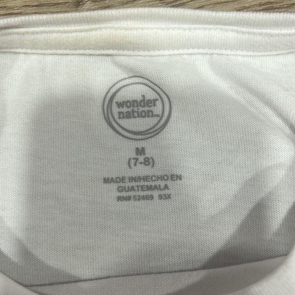 White tee slits on sleeves and on sides where made at home - Picture 3 of 4